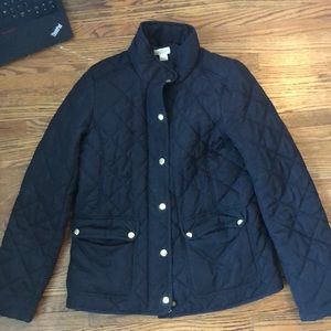 Black coat with gold accents.